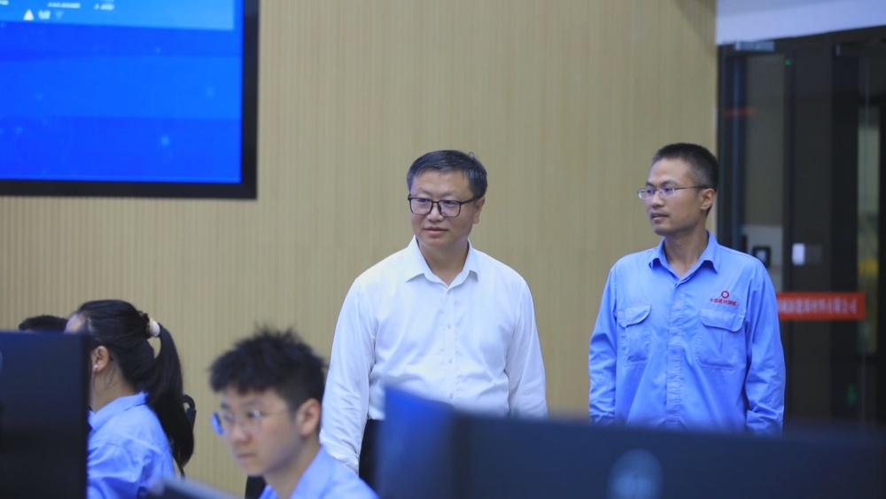 圖為林江平（左）工作時.jpg